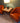 Pair of Orange Retro Vinyl Rolling Chairs